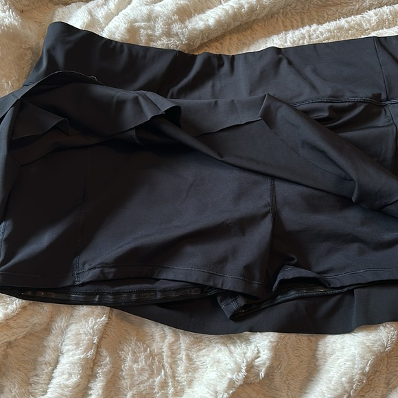 Athleta Black Skort with back zipper pocket. - Picture 7 of 8